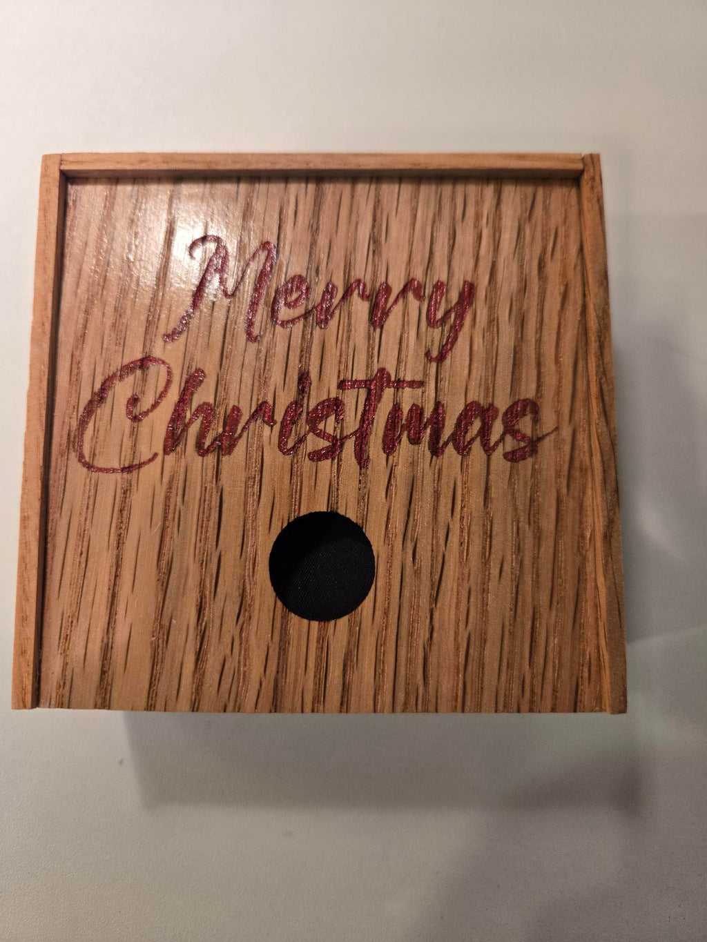 Top view of engraved Merry Christmas slide-top gift box