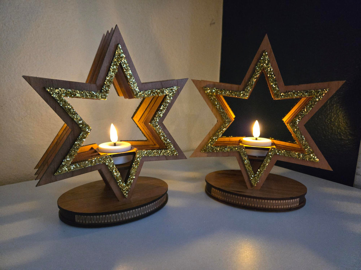 Single laser-cut star candle holder with tealight glowing in dark setting