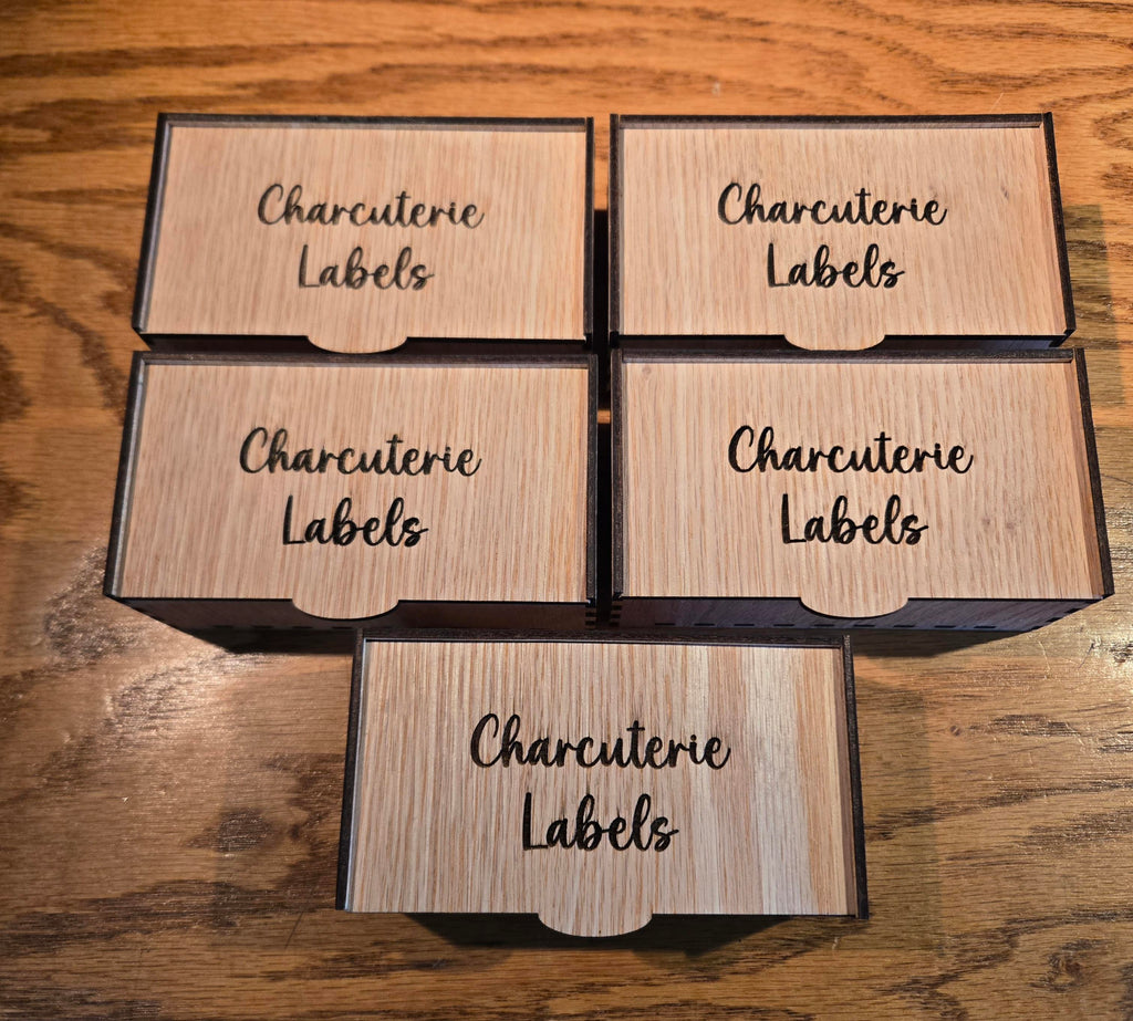 Laser engraved charcuterie label box set open showing labels